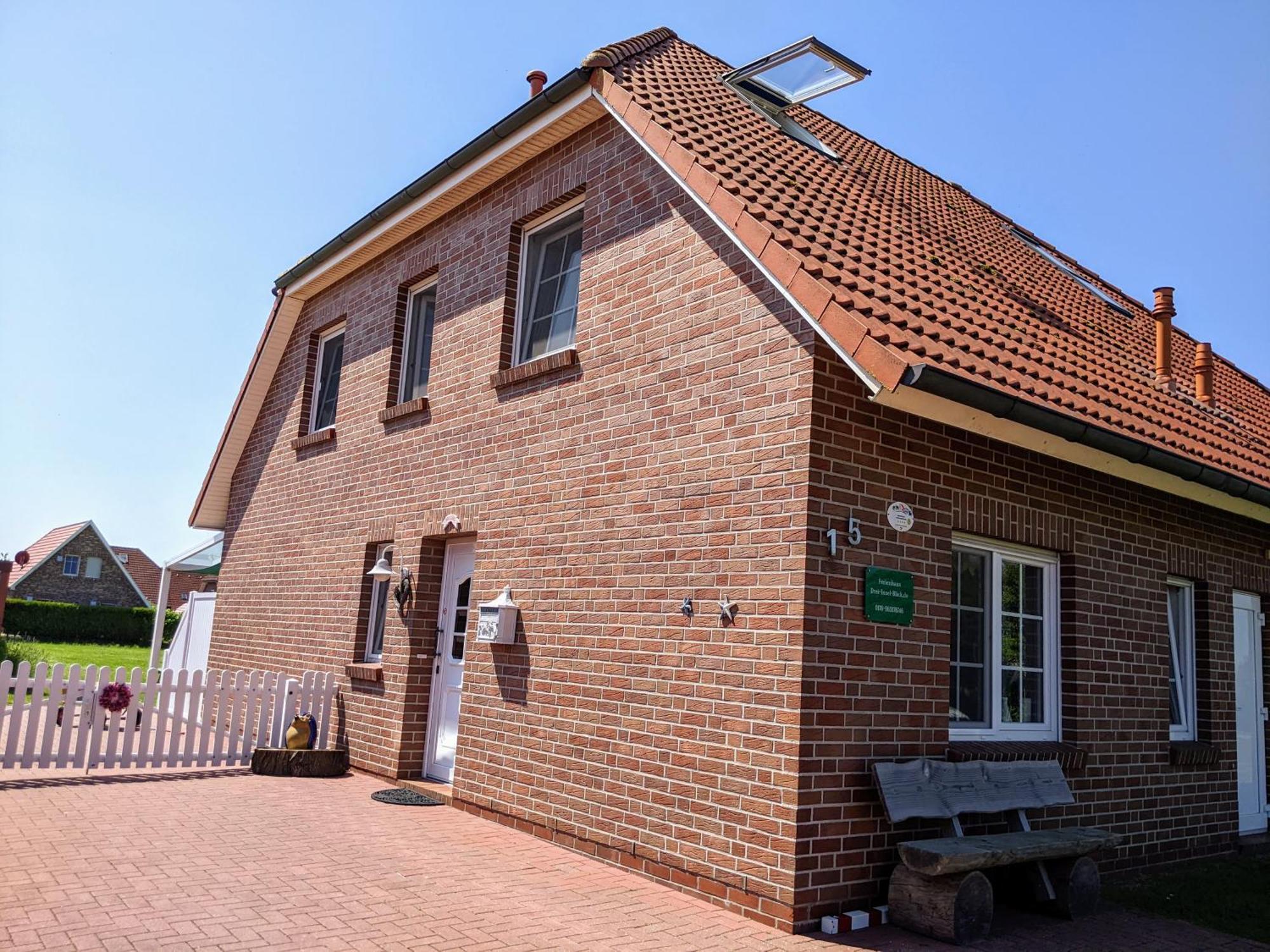 Drei-Insel-Blick Neßmersiel Esterno foto